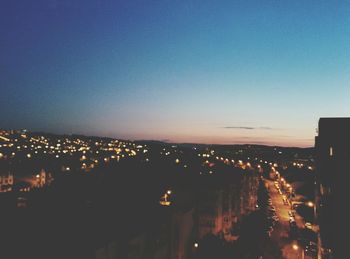 Illuminated cityscape at night