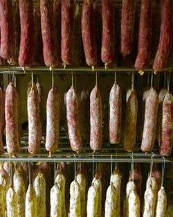 Close-up of food hanging at commercial kitchen