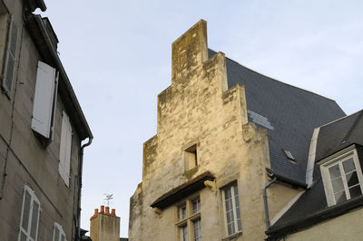 Low angle view of buildings against sky