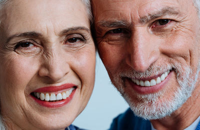 Close-up portrait of smiling couple