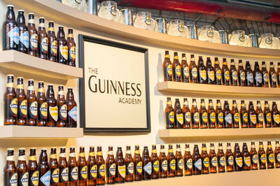 Row of bottles on display at store