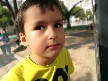 Close-up of innocent boy at park