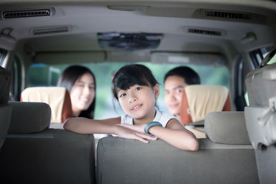 Portrait of family in car