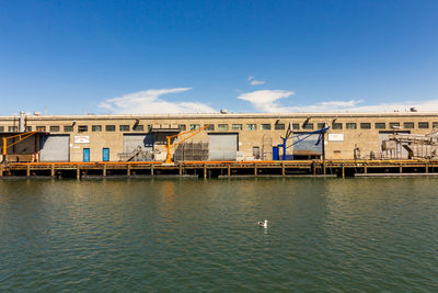 View of built structures against blue sky