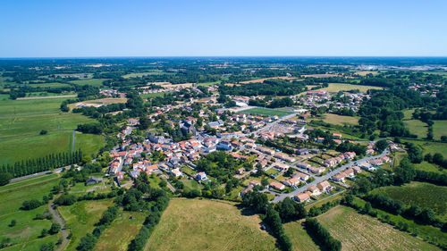 High angle view of agricultural field against clear sky