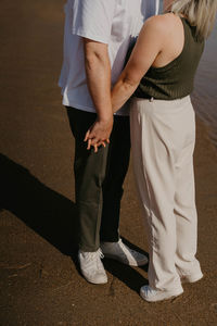 Couple holding hands 