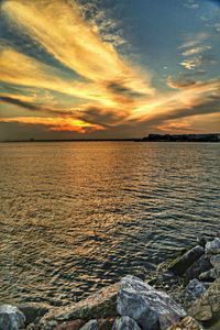 Scenic view of sea at sunset