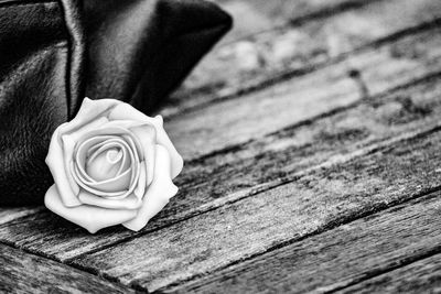 Close-up of rose on table