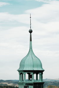 High section of building against cloudy sky