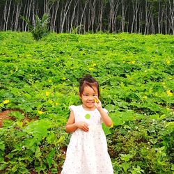 Full length of cute girl standing on land