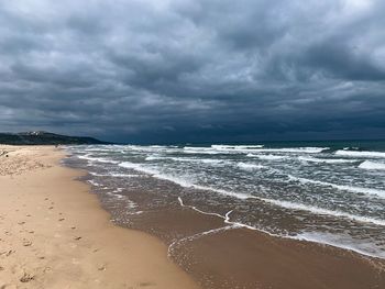 Scenic view of beach against sky