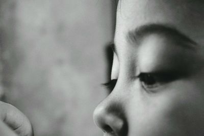 Close-up portrait of woman looking away