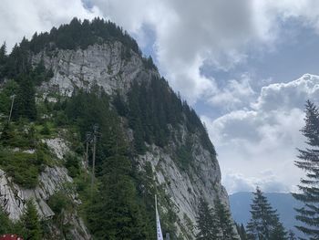 Panoramic view of trees and mountains against sky