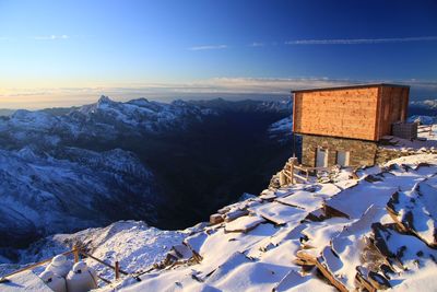 Snow covered mountain against sky