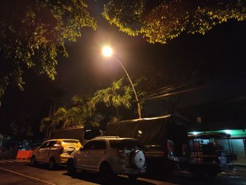 Cars on road at night