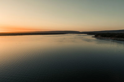 Scenic view of sea against sky during sunset