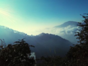 Scenic view of silhouette mountain against sky
