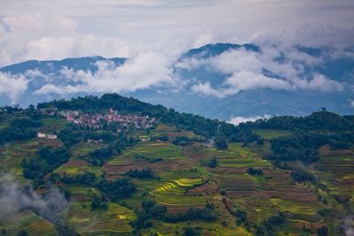 Landscape with mountain range in background