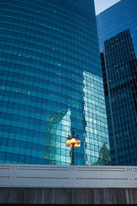 Reflection of modern building in swimming pool