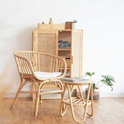 Chairs on table against wall at home