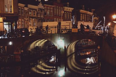 Bridge over river at night