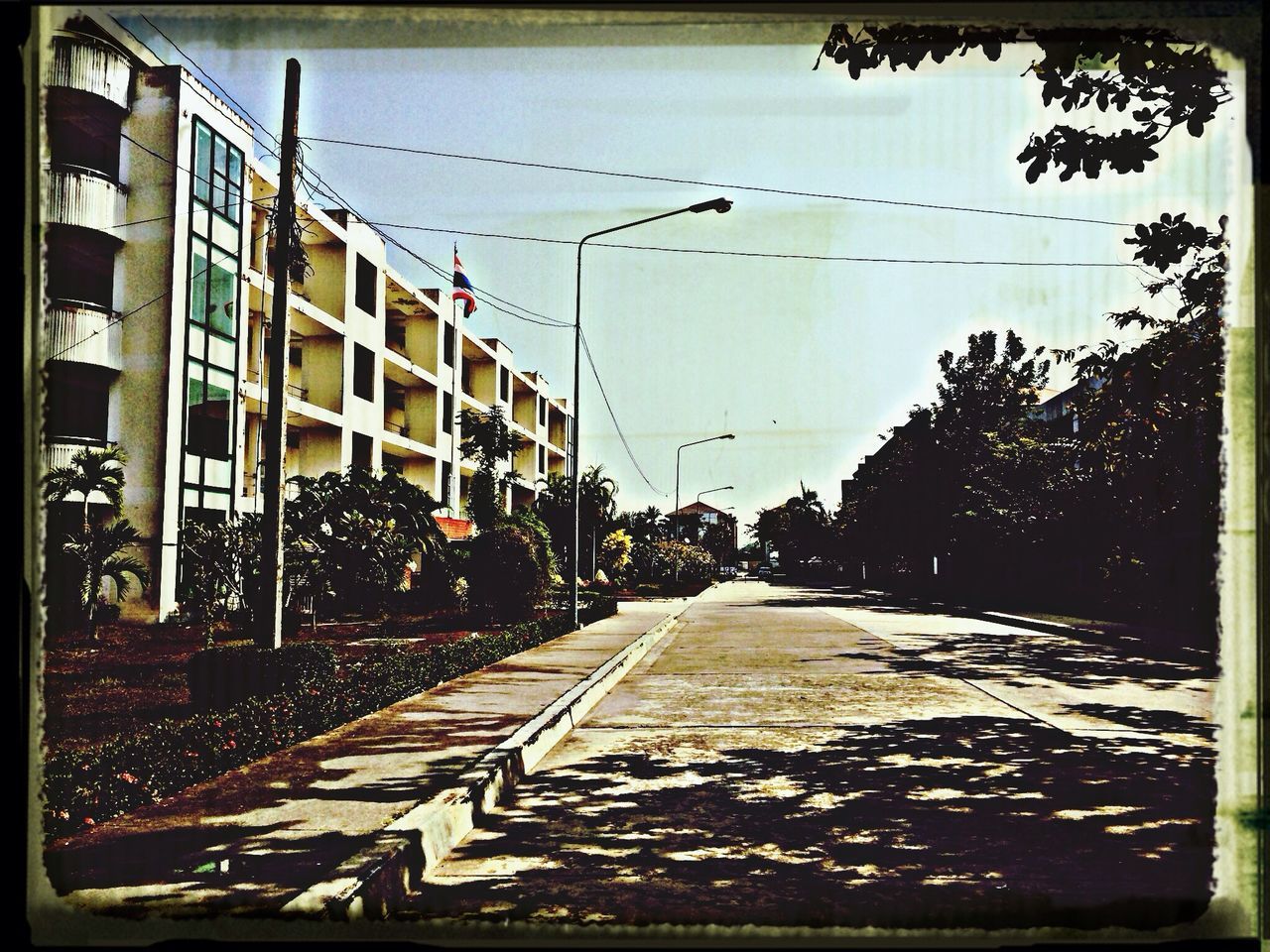 the way forward, clear sky, diminishing perspective, architecture, transfer print, built structure, building exterior, vanishing point, transportation, auto post production filter, street, railroad track, house, long, sky, outdoors, day, empty, power line, residential building