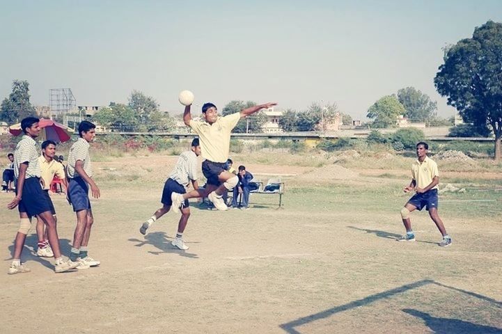 lifestyles, leisure activity, full length, men, large group of people, enjoyment, person, sport, fun, casual clothing, tree, playing, togetherness, clear sky, mixed age range, walking, motion, riding, boys