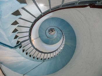 Low angle view of spiral staircase in building