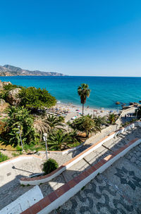 Scenic view of sea against clear blue sky