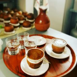 Close-up of coffee cup on table