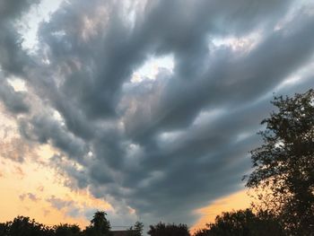 Low angle view of dramatic sky during sunset