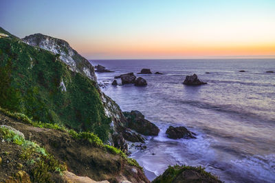 Scenic view of sea against sky during sunset