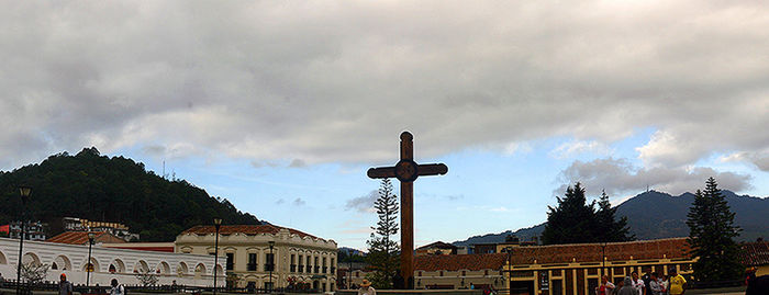Low angle view of building against cloudy sky