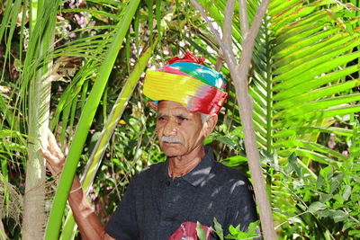 Portrait of man standing in farm