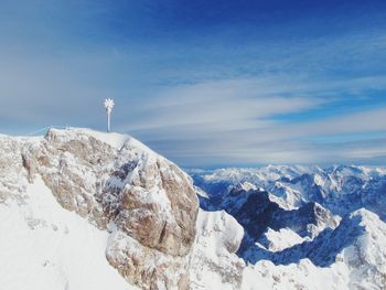 Scenic view of snowcapped mountains against sky