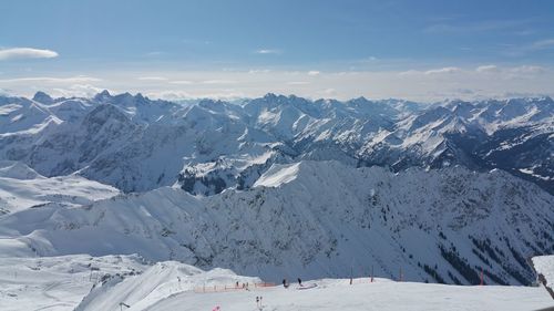 Scenic view of snowcapped mountains against sky