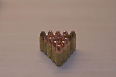 Close-up of coins over white background
