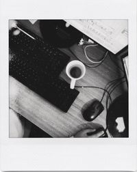 High angle view of coffee cup on table