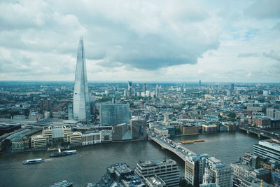High angle view of thames river by shard london bridge amidst city