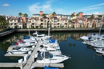 Boats moored at harbor