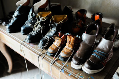 High angle view of shoes arranged in pair on table