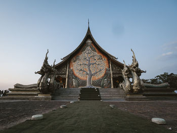 Exterior of temple against building