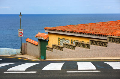 View of sea against clear blue sky