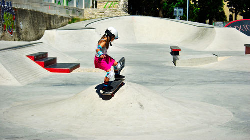Girl skating at park