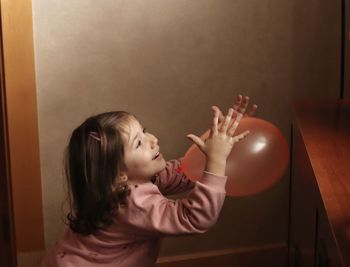 Portrait of cute girl at home