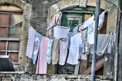Clothes drying outside house
