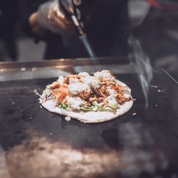 Close-up of hand holding food