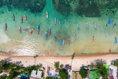 High angle view of people on sea shore