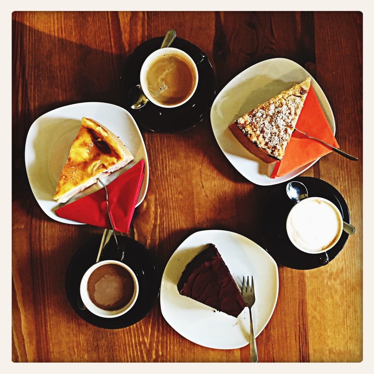 food and drink, table, drink, indoors, coffee cup, freshness, refreshment, still life, saucer, coffee - drink, plate, food, high angle view, coffee, directly above, wood - material, spoon, breakfast, cup, healthy eating