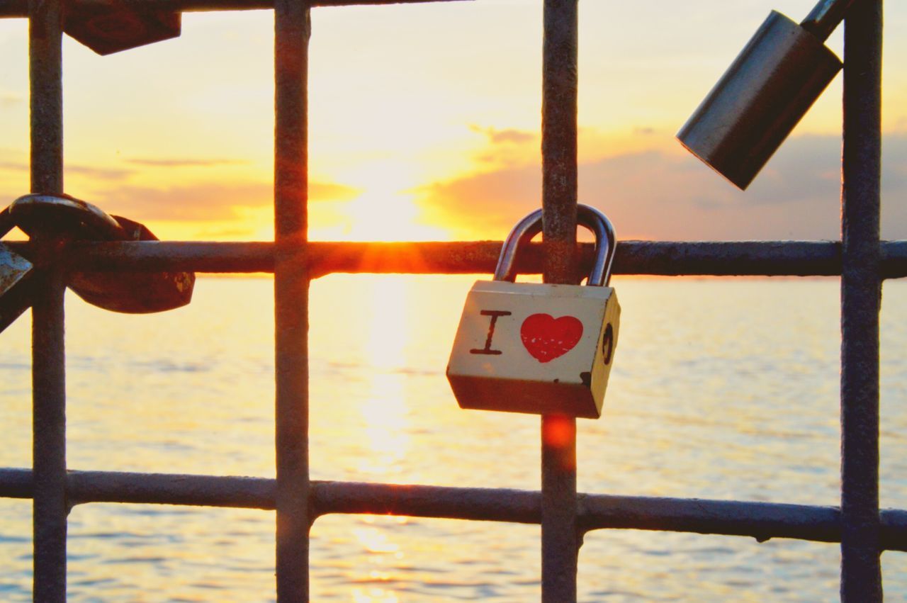 padlock, security, metal, safety, lock, protection, love, railing, focus on foreground, close-up, love lock, hanging, luck, no people, safe, hope, attached, day, sky, faith, outdoors, nature